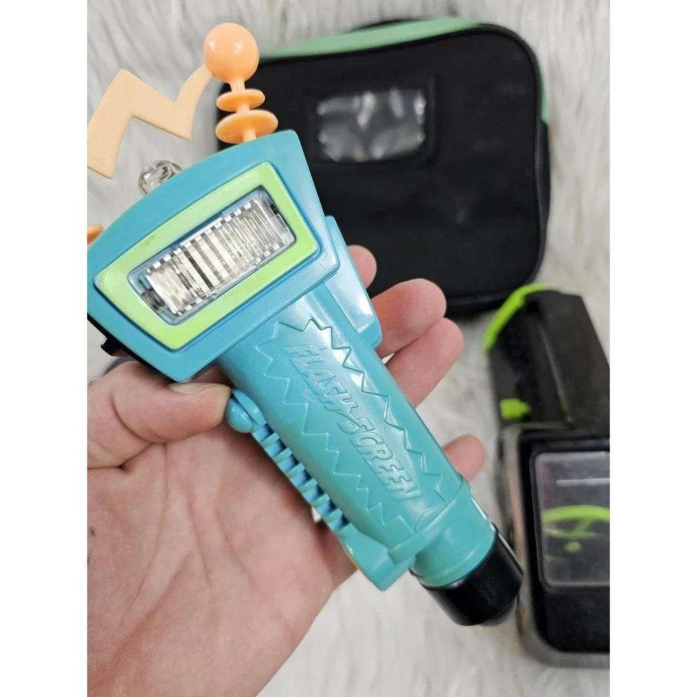 Nickelodeon Photo Blaster Camera, Slime Lunchbox, Lazer Light, and Flash Screen